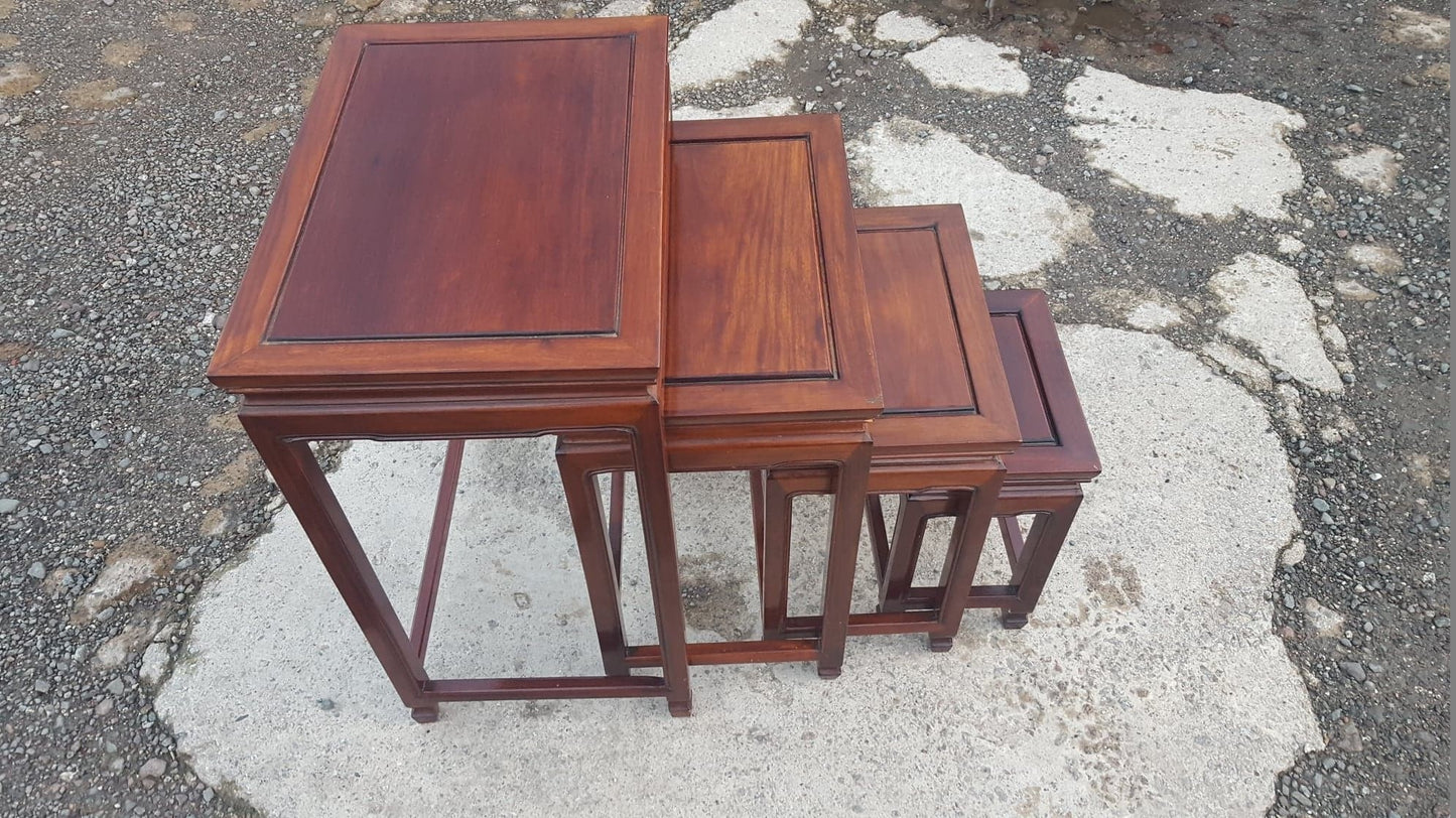 Nest of Four Rosewood Tables